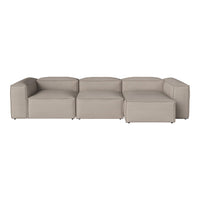 "Light beige modular sofa with a smooth, textured fabric and minimalist design."