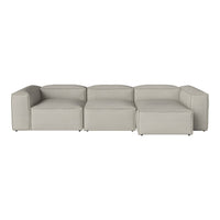 Modern light gray sectional sofa with a minimalist design and smooth, solid fabric upholstery.
