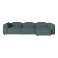 Teal modern sectional sofa with clean lines and textured fabric, perfect for contemporary living spaces.