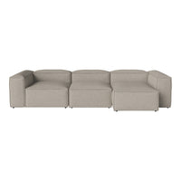 Light gray modular sectional sofa with a smooth, minimalist design and soft, textured fabric finish.