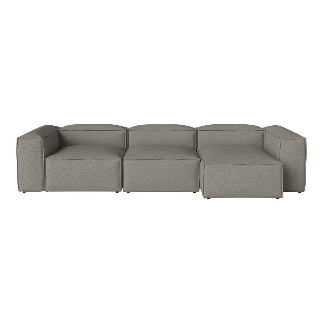 Modern gray sectional sofa with clean lines and a textured fabric, perfect for contemporary living spaces.