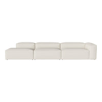 Minimalist white modular sofa with clean lines and a seamless design, perfect for modern living spaces.