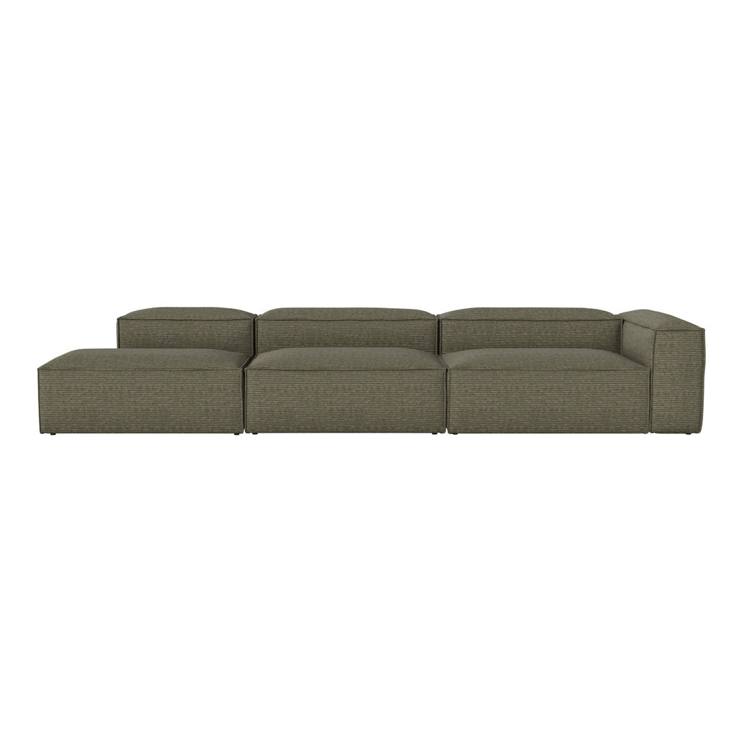 Olive green modular sofa with a textured weave pattern, ideal for modern living spaces.