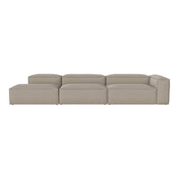 Beige modular sofa with a smooth, textured upholstery and minimalist design, perfect for modern living spaces.
