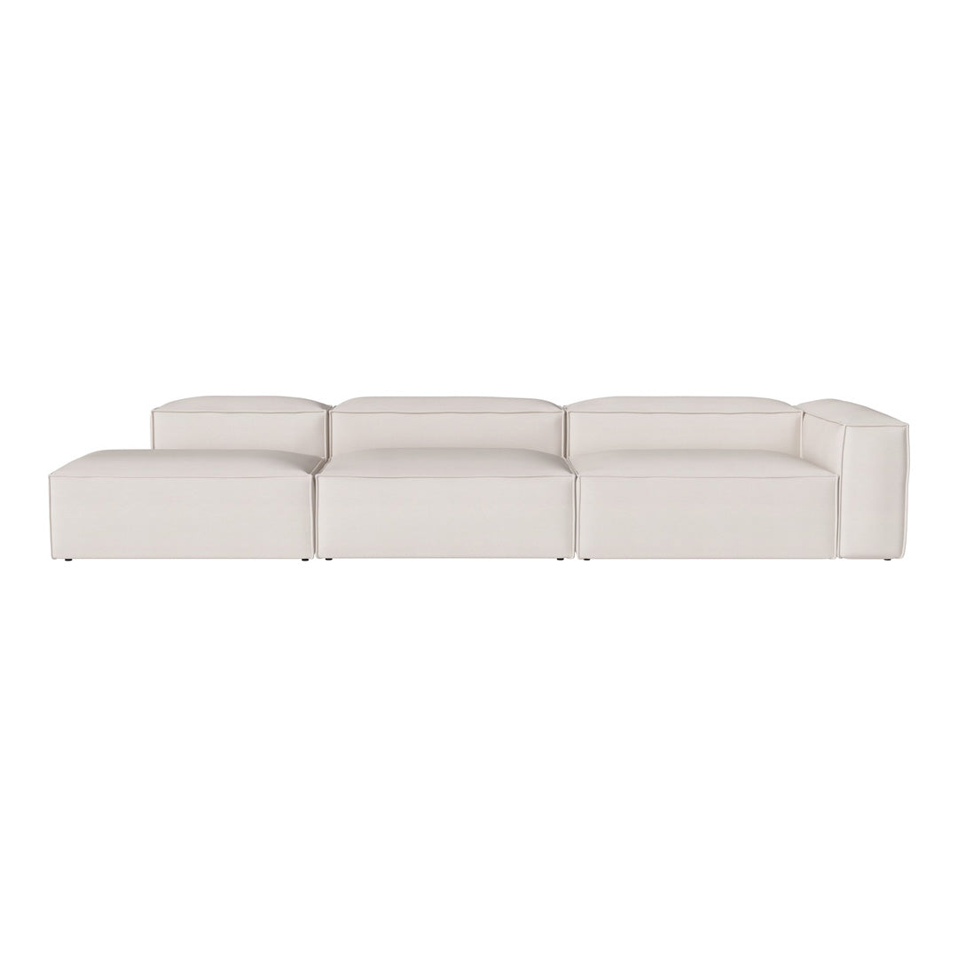 Cream-colored modular sofa with minimalistic design and smooth, solid surface texture. Perfect for modern interiors.