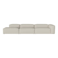 Beige modular sofa with a smooth, minimalist design and clean lines, perfect for modern living spaces.