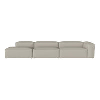 Light grey modular sofa with a minimalist design and smooth, solid surface. Perfect for modern living spaces.