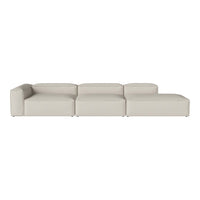 Modern sectional sofa in soft beige leather with minimalist design and smooth, clean lines. Ideal for contemporary spaces.