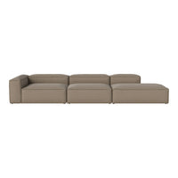 Contemporary modular sofa in a warm beige color with a smooth, textured fabric finish.