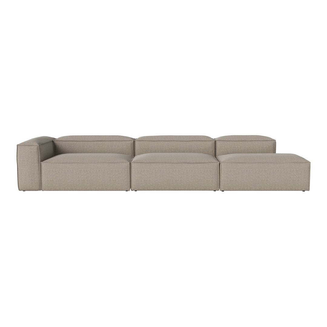 Neutral beige modular sofa with a smooth, textured fabric pattern, perfect for modern living spaces.