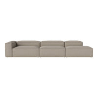 Neutral beige modular sofa with a smooth, textured fabric pattern, perfect for modern living spaces.