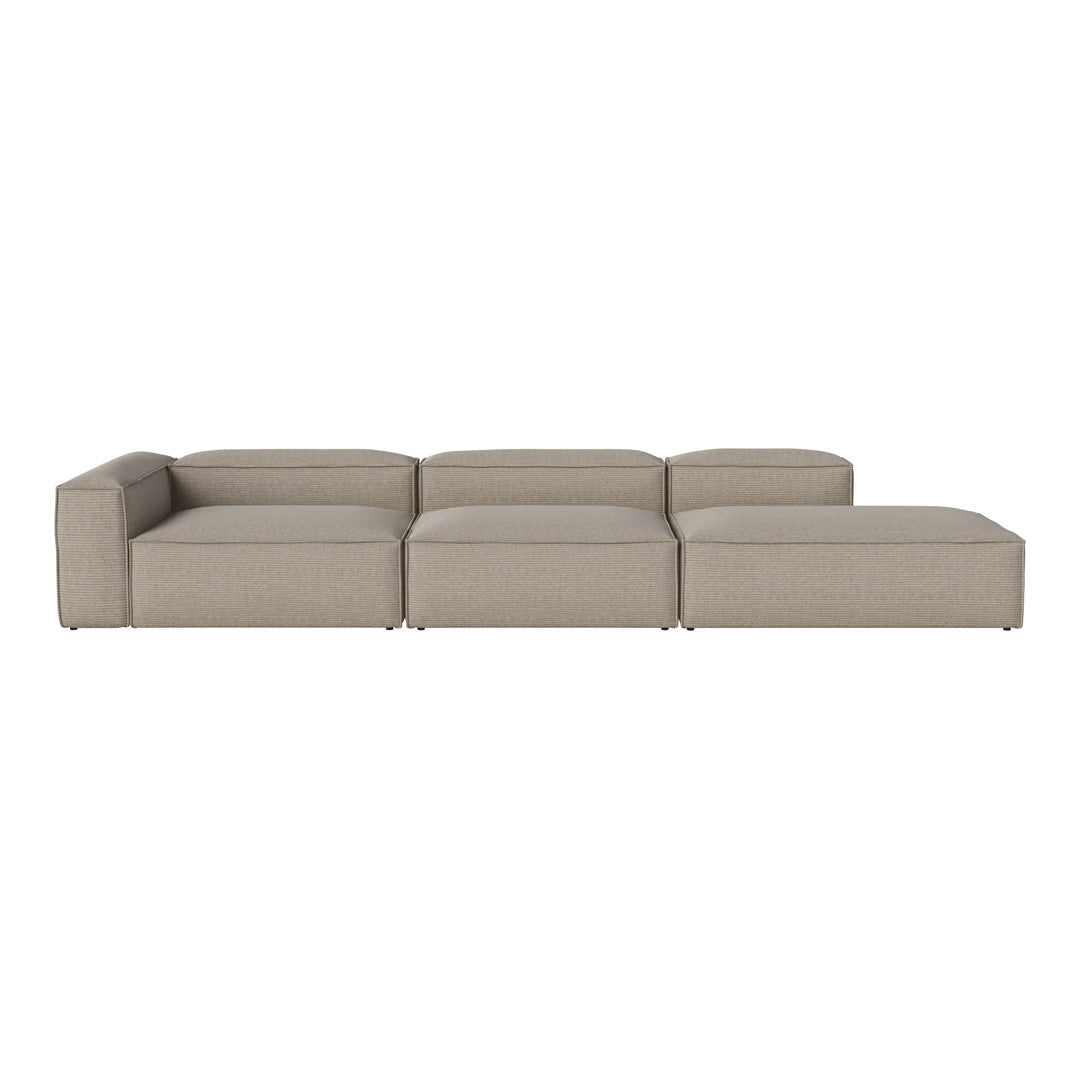 Light beige modular sofa with textured fabric, featuring a modern, minimalist design and clean lines.