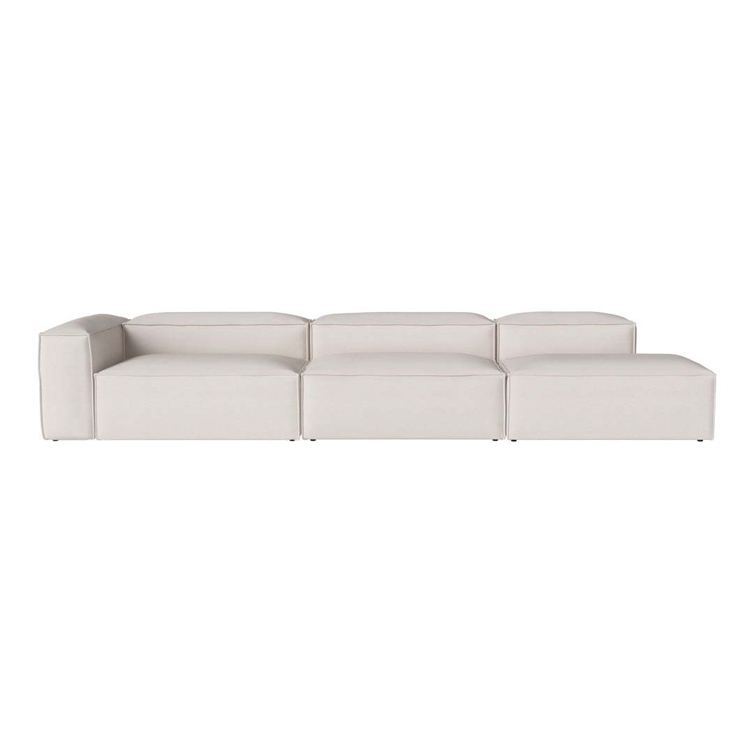 Modern cream sectional sofa with sleek lines and a minimalist design, perfect for contemporary interiors.