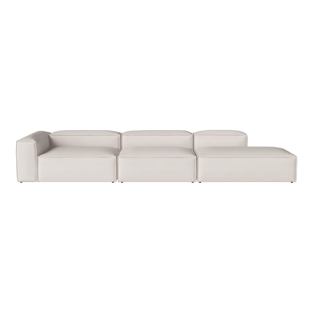 Modern sectional sofa in soft white upholstery with clean lines and minimalistic design. Perfect for contemporary spaces.