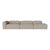 Light beige modular sofa with a smooth, minimalist design, featuring solid, uniform upholstery.
