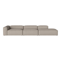 Neutral beige sectional sofa with a sleek, modern design and smooth, solid fabric upholstery.