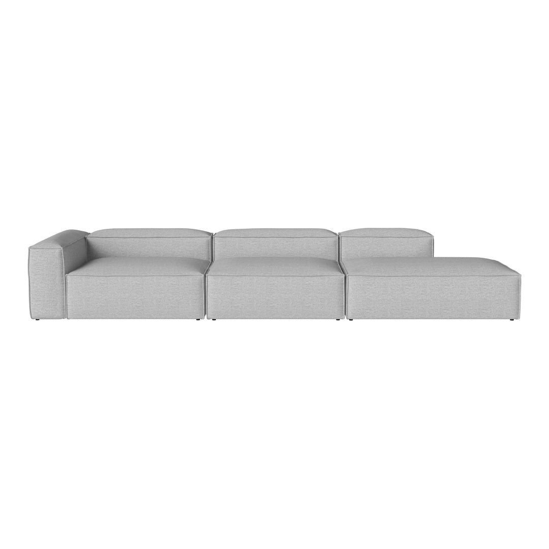 Modern gray sectional sofa with a sleek, minimalist design and subtle textured fabric. Perfect for contemporary spaces.
