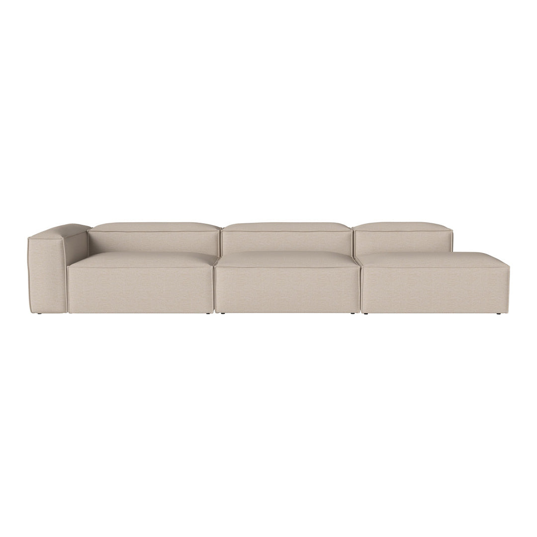 Beige modular sofa with smooth, minimalist design and clean lines, perfect for modern living spaces.