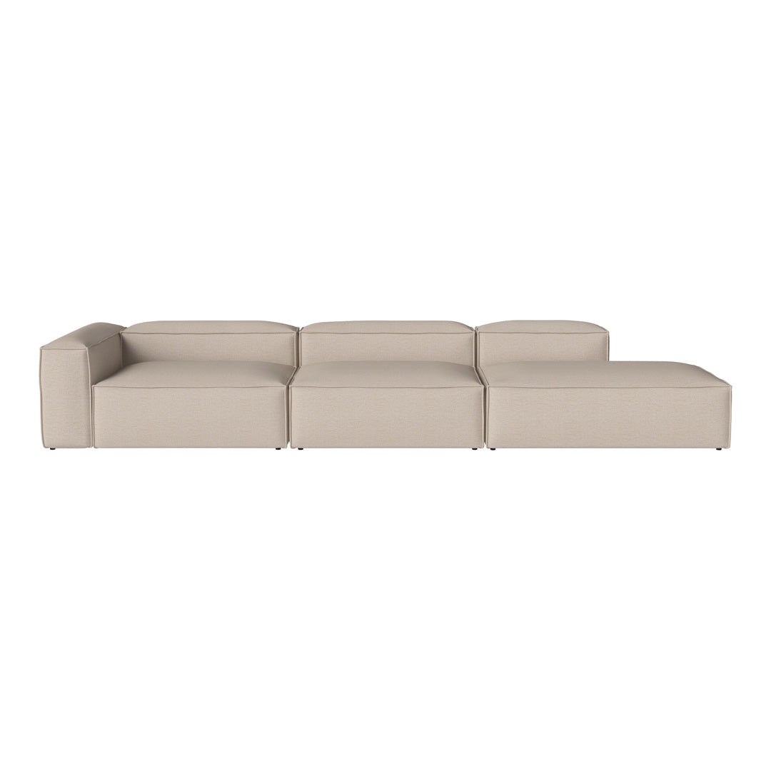Beige modular sofa with a smooth, modern design, featuring clean lines and no visible patterns. Perfect for minimalistic decor.