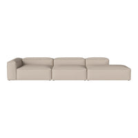 Beige modular sofa with a smooth, modern design, featuring clean lines and no visible patterns. Perfect for minimalistic decor.