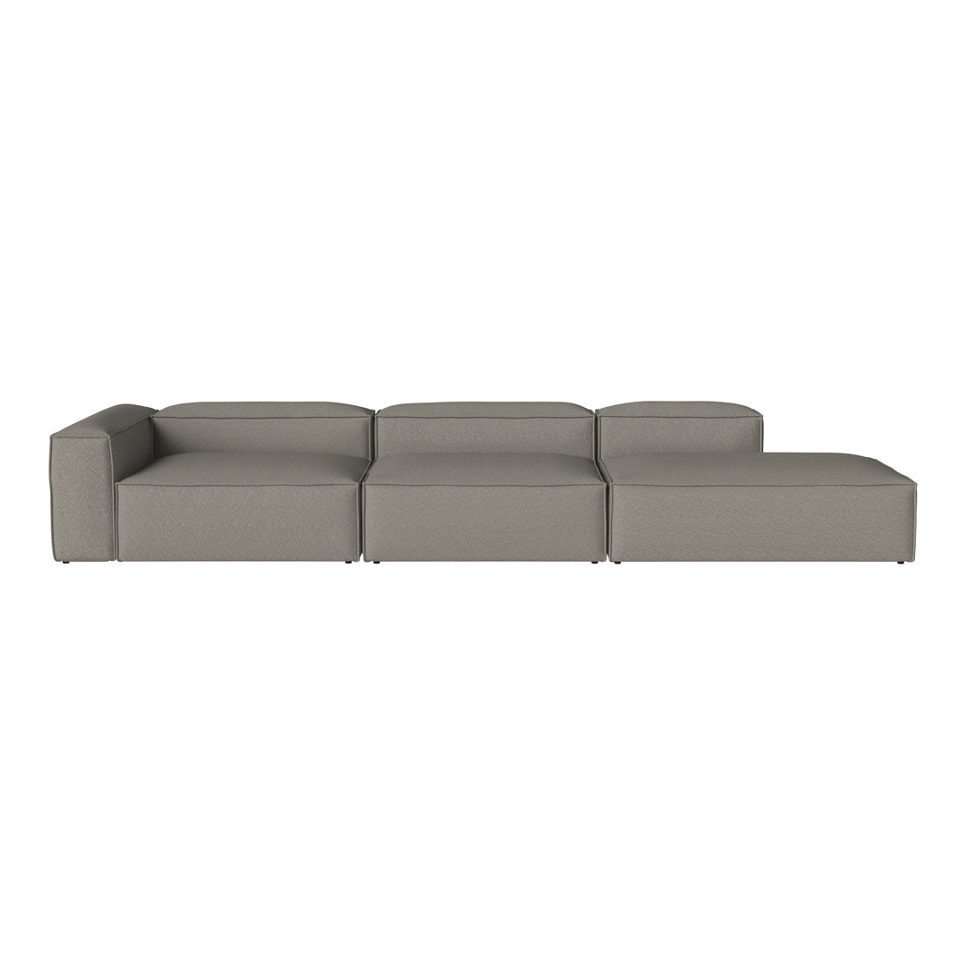 Gray modular sofa with a sleek, minimalist design and smooth texture, perfect for modern interiors.