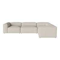 Modern beige sectional sofa with seamless design and soft texture, perfect for contemporary living spaces.