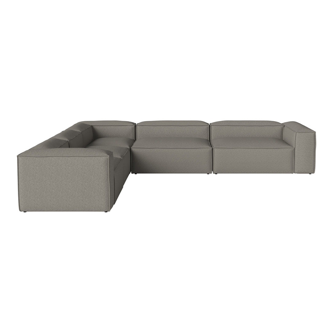 Gray sectional sofa with a sleek, modern design and smooth fabric texture, perfect for contemporary living spaces.