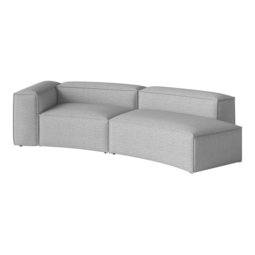 Curved gray sectional sofa with a textured fabric pattern and seamless design for modern interiors.