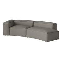 Curved gray sectional sofa with a textured fabric finish, offering modern design and comfortable seating.