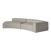Gray curved sectional sofa with a textured fabric design, offering a modern, minimalist look for contemporary spaces.