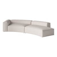 Curved sectional sofa in soft, light gray upholstery with smooth, minimalist design and subtle texture.