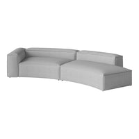 Gray modern curved sofa with a smooth, minimalist design and subtle texture. Ideal for contemporary spaces.