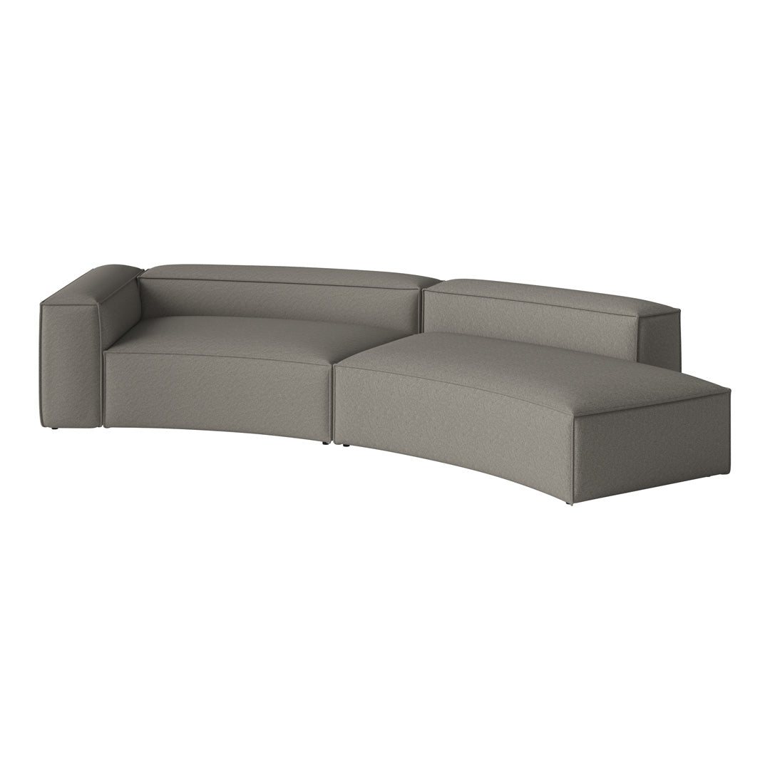 Gray curved sectional sofa with a smooth, minimalist textured fabric design. Perfect for modern living spaces.