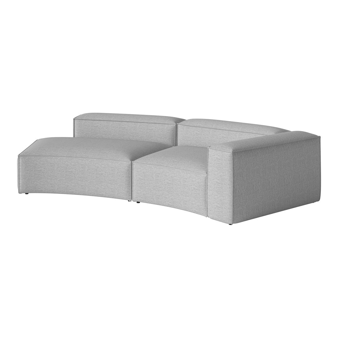Curve-shaped gray sofa with a textured fabric pattern, perfect for modern living spaces.