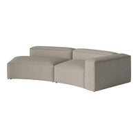 Gray sectional sofa with a sleek, modern design and smooth, minimalist pattern. Ideal for contemporary interiors.