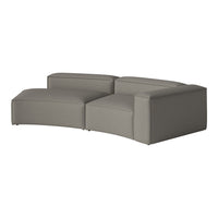 Curved modern sectional sofa in a soft light grey fabric with subtle texture and minimalist design.