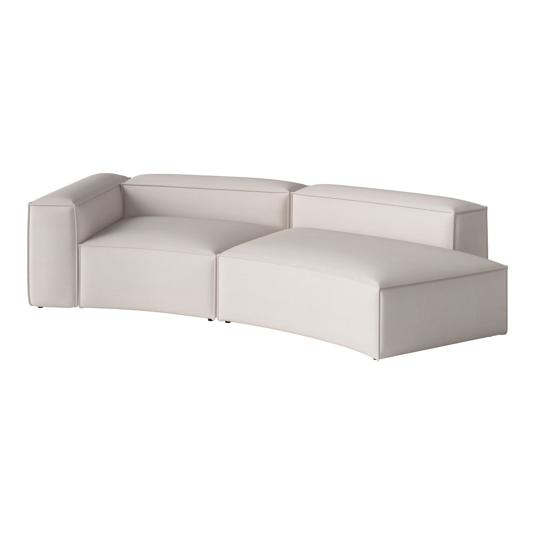 Light beige modern sectional sofa with smooth, minimalist design and soft, textured upholstery. 
