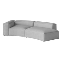 Curved sectional sofa in a soft light gray fabric with a subtle textured pattern. Modern and minimalist design.