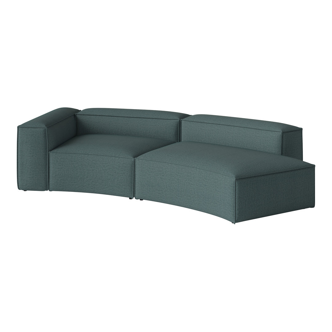 Teal modular sectional sofa with a subtle textured fabric and smooth, curved lines for a modern look.