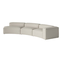 Curved sectional sofa in soft cream upholstery with smooth, minimalist design and no visible patterns.