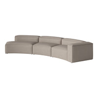 Curved modular sofa in soft beige fabric with smooth, minimalistic design and clean lines. Perfect for modern interiors.