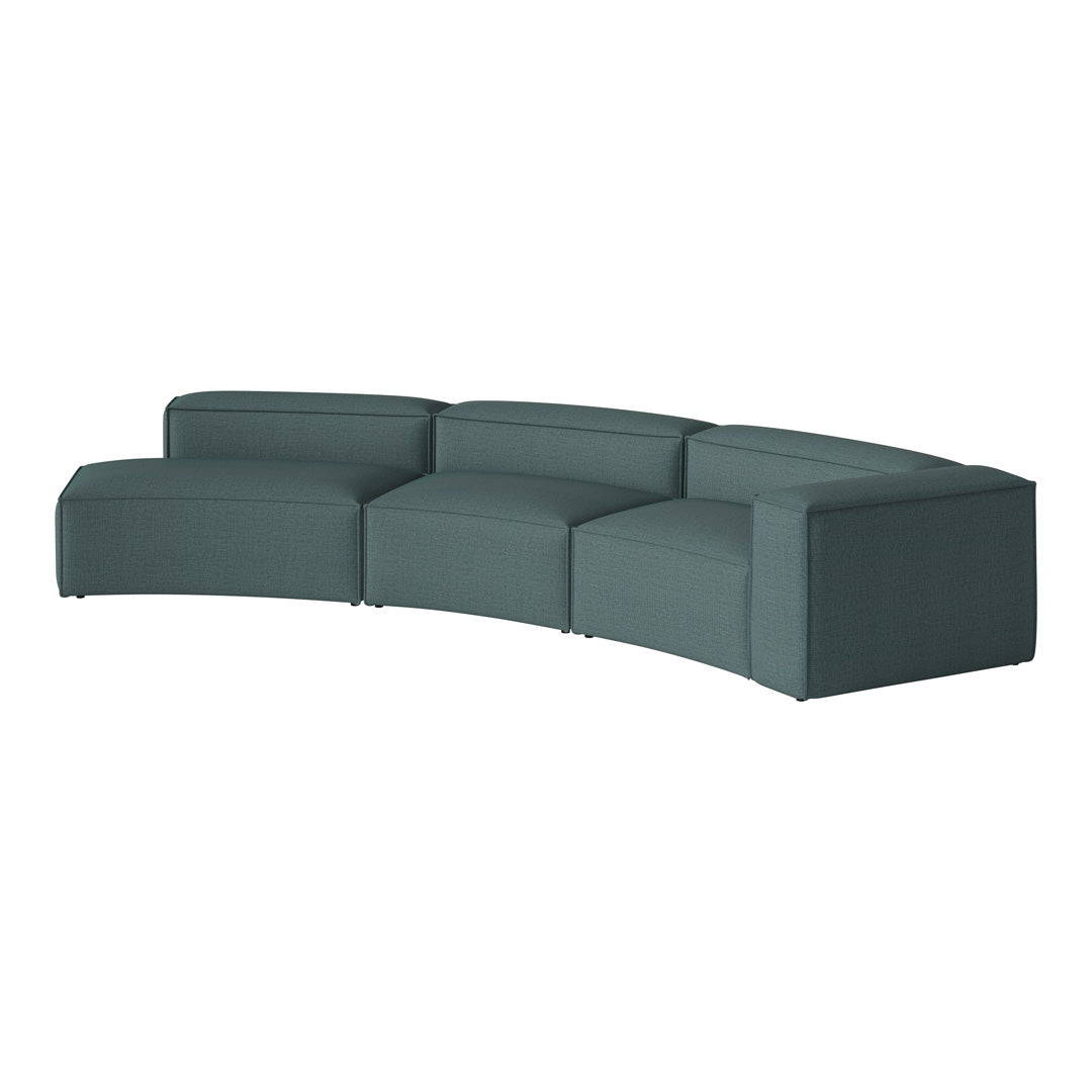 Teal curved sectional sofa with a textured fabric, featuring modern, minimalist design. Perfect for stylish living spaces.