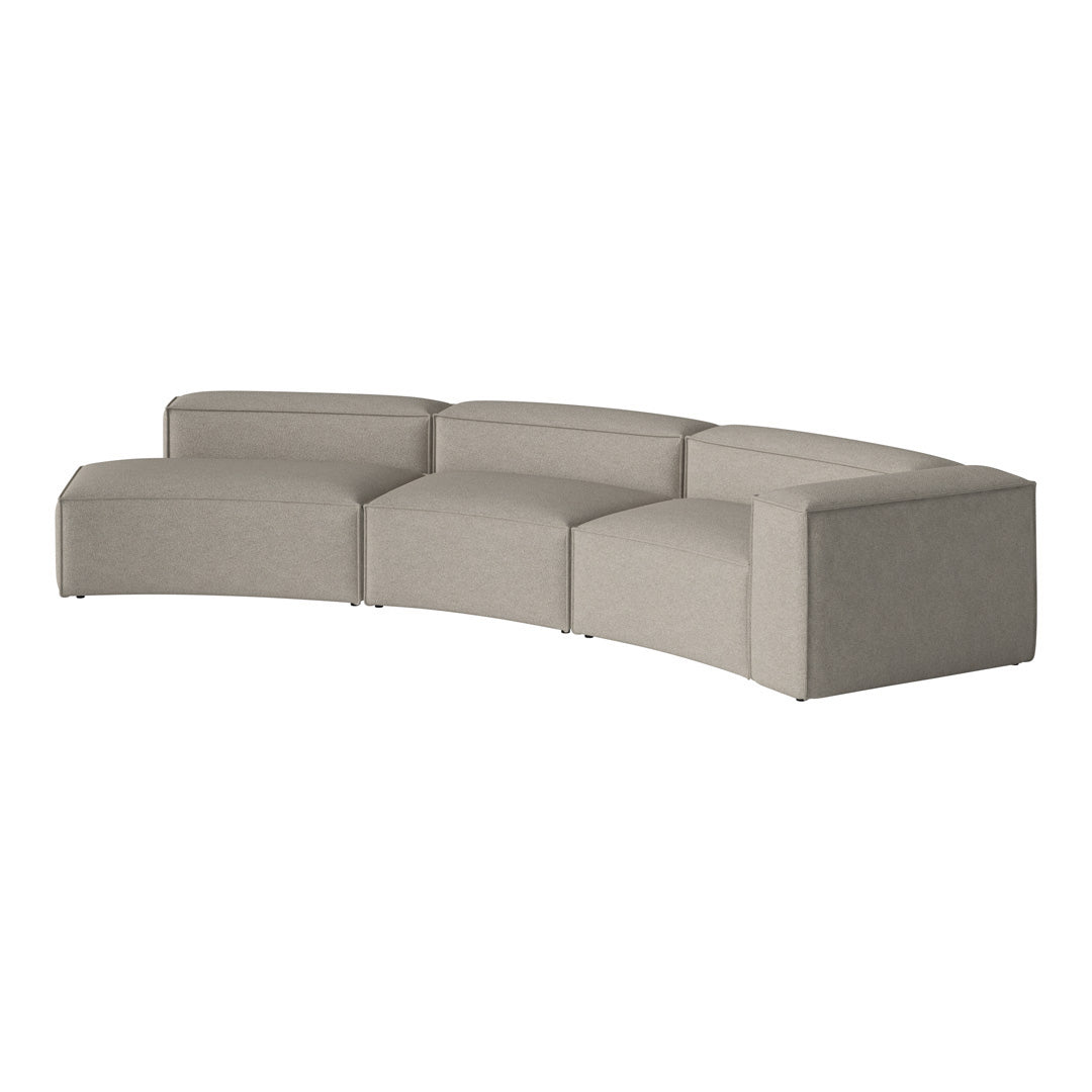 Curved sectional sofa in soft gray fabric with a modern, minimalist design and subtle texture. Ideal for contemporary decor.