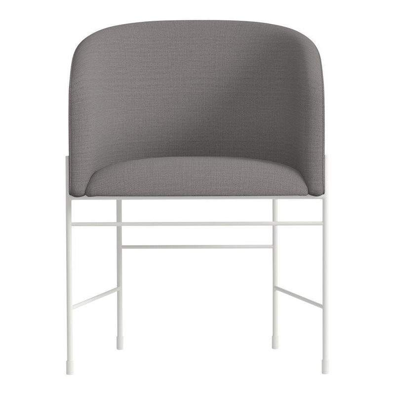 Gray upholstered chair with a smooth fabric texture and a minimalist white metal frame. Elegant and modern design.