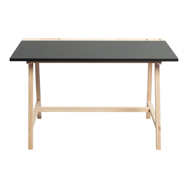 Black tabletop with natural wood legs, modern design and minimalistic style, ideal for any workspace.
