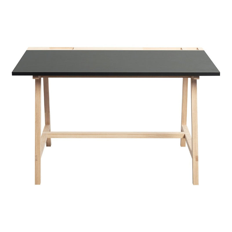 Black tabletop with natural wood legs, modern design and minimalistic style, ideal for any workspace.