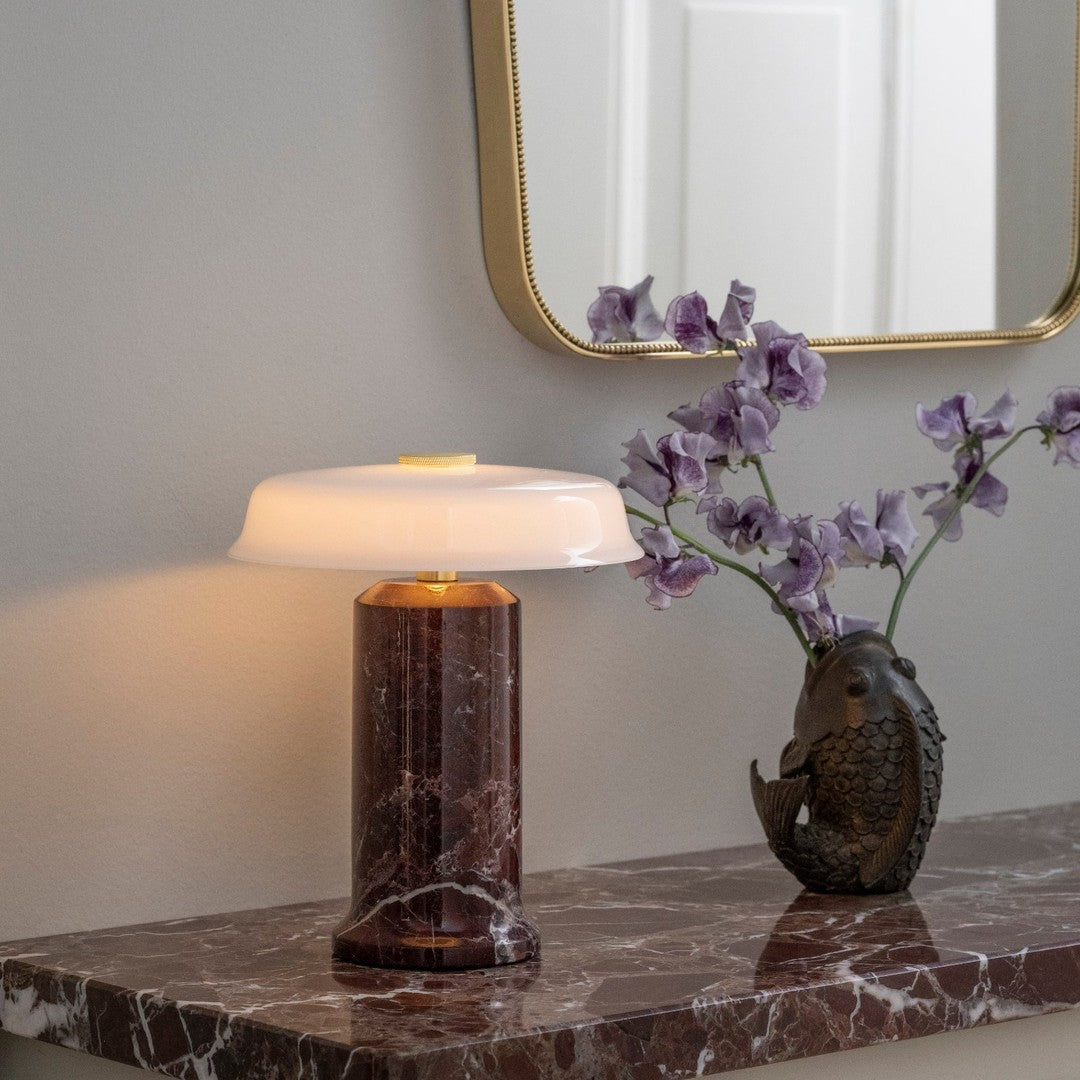 Modern marble lamp with a glossy white shade, featuring rich burgundy and veined patterns, perfect for elegant decor.