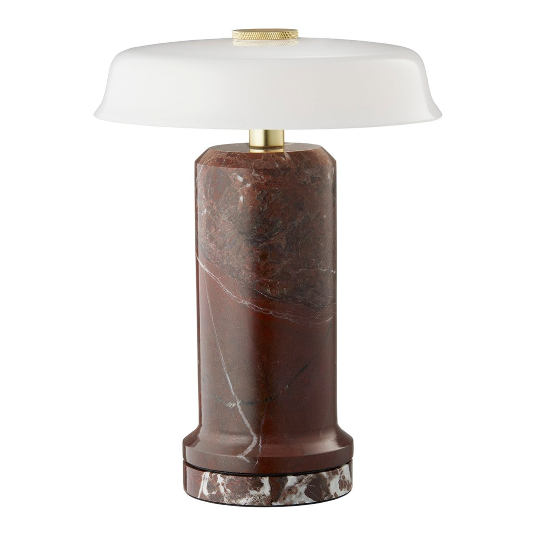 Marble lamp with deep red hues, white glass shade, and elegant brass accent. Unique marble patterns create visual interest.
