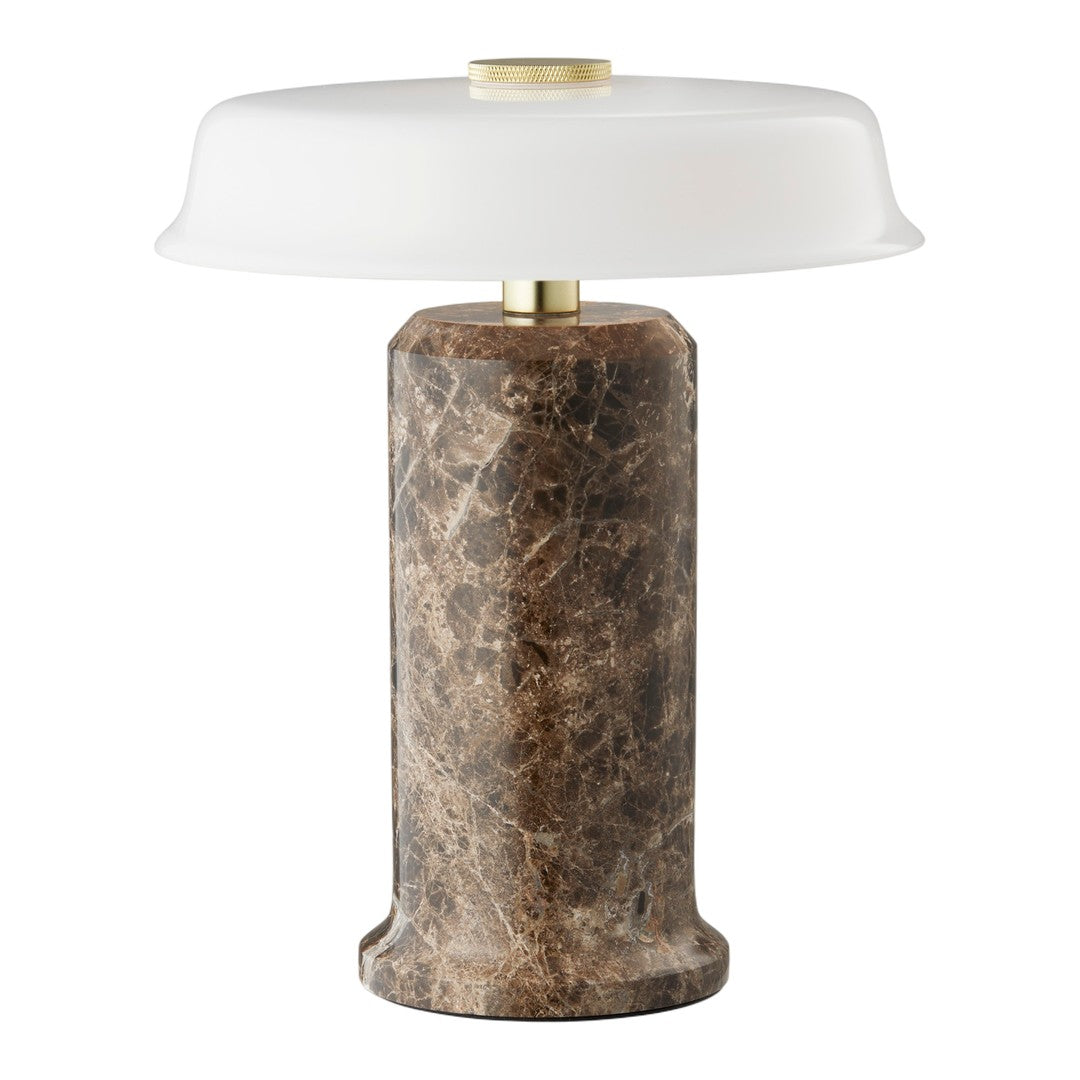 Elegant brown marble lamp base with a sleek white glass shade and brass accent, perfect for modern decor.