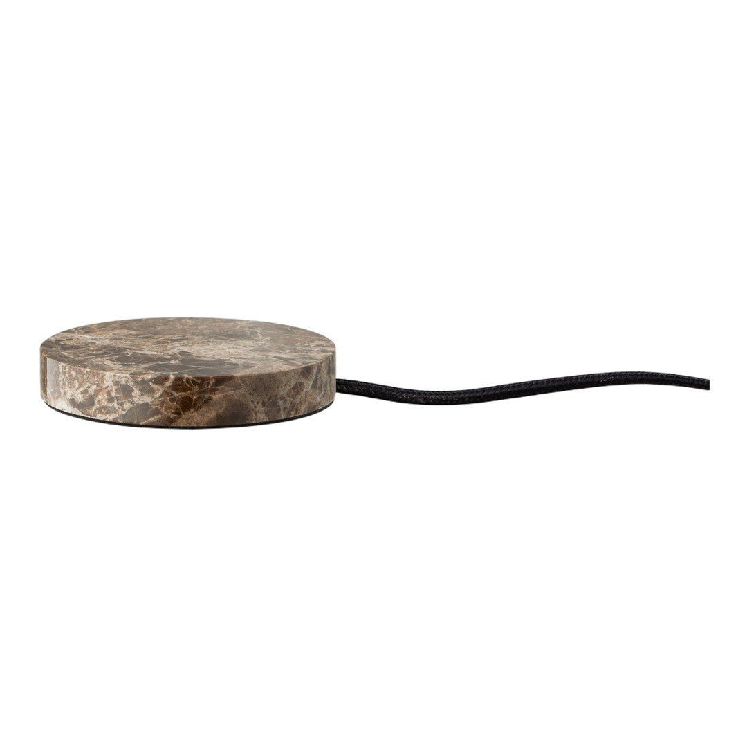 Round stone-like base in natural gray tones with a sleek black cord. Perfect for modern home decor.